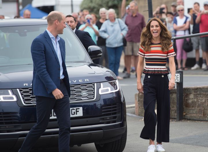 The Duke and Duchess of Cambridge arrive at the Royal Yacht Squadron during the inaugural King's Cup regatta on Aug. 8 in Cow