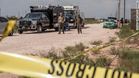 FBI agents search a home believed to be linked to a suspect following a deadly shooting spree on September 1, 2019 in West Odessa, Texas.