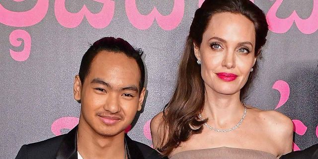 Maddox Jolie Pitt poses with Angelina Jolie at the New York premiere of "First They Killed My Father" in September 2017. Maddox has been very close with mom Jolie, who adopted him from Cambodia before meeting ex Brad Pitt.