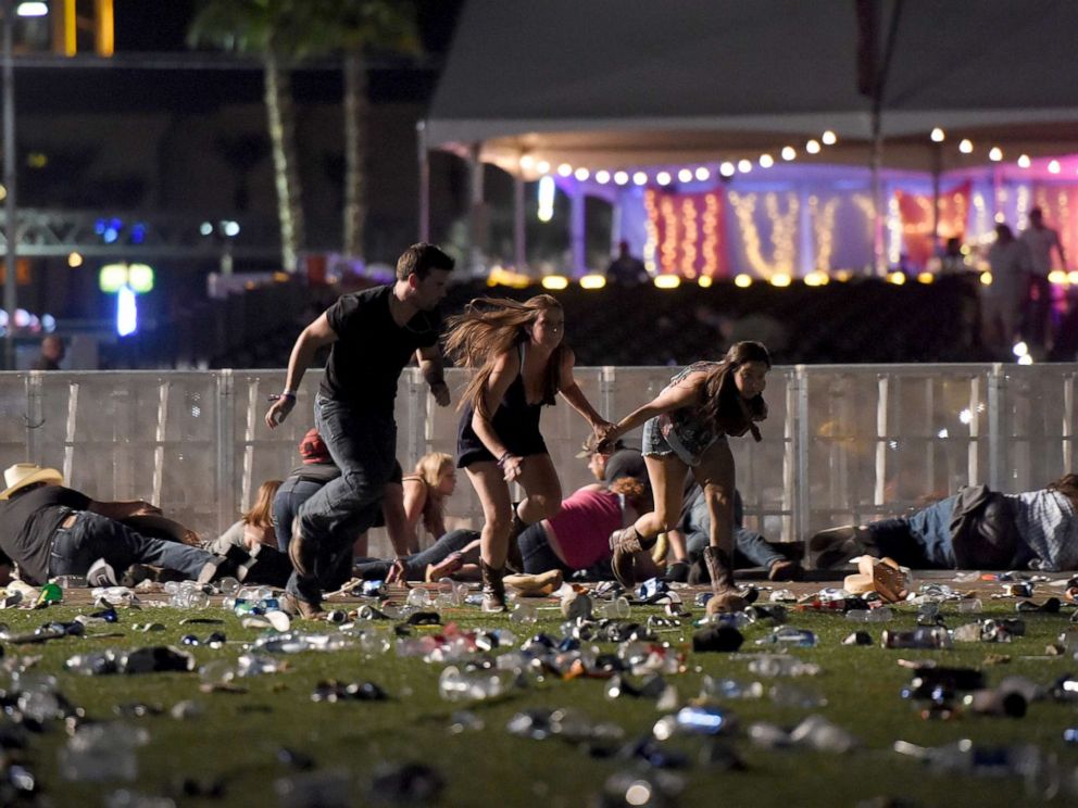 PHOTO: People run from the Route 91 Harvest country music festival after apparent gun fire was heard, Oct. 1, 2017, in Las Vegas.