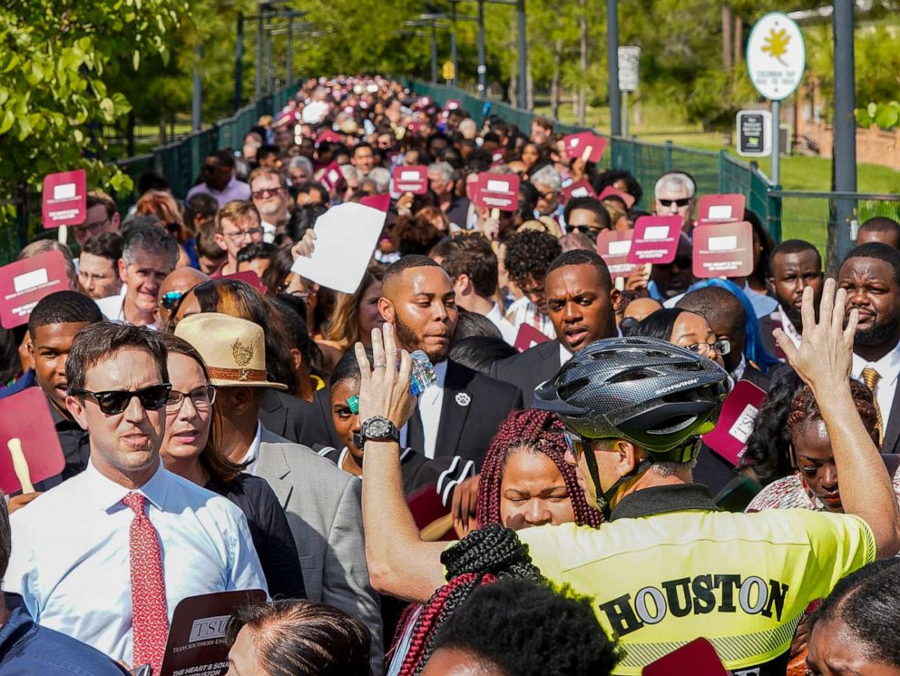 PHOTO: People wait to go through security before entering the Democratic presidential debate inside Texas Southern Universitys Health & PE Arena in Houston, Thursday, Sept. 12, 2019.