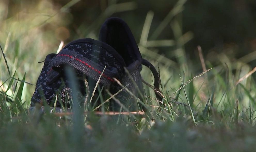 PHOTO: A lost shoe is pictured outside the scene where a homeowner shot and killed three men who were wearing masks early Monday morning on Sept. 16, 2019, in Rockdale County, Ga.