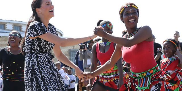 Meghan, Duchess of Sussex dances as she visits a Justice Desk initiative in Nyanga township, with Prince Harry, Duke of Sussex, during their royal tour of South Africa on September 23, 2019, in Cape Town, South Africa. The Justice Desk initiative teaches children about their rights and provides self-defense classes and female empowerment training to young girls in the community. (Photo by Chris Jackson/Getty Images)