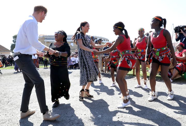 The Sussexes dance as they visit a Justice Desk initiative in Nyanga township.&nbsp;