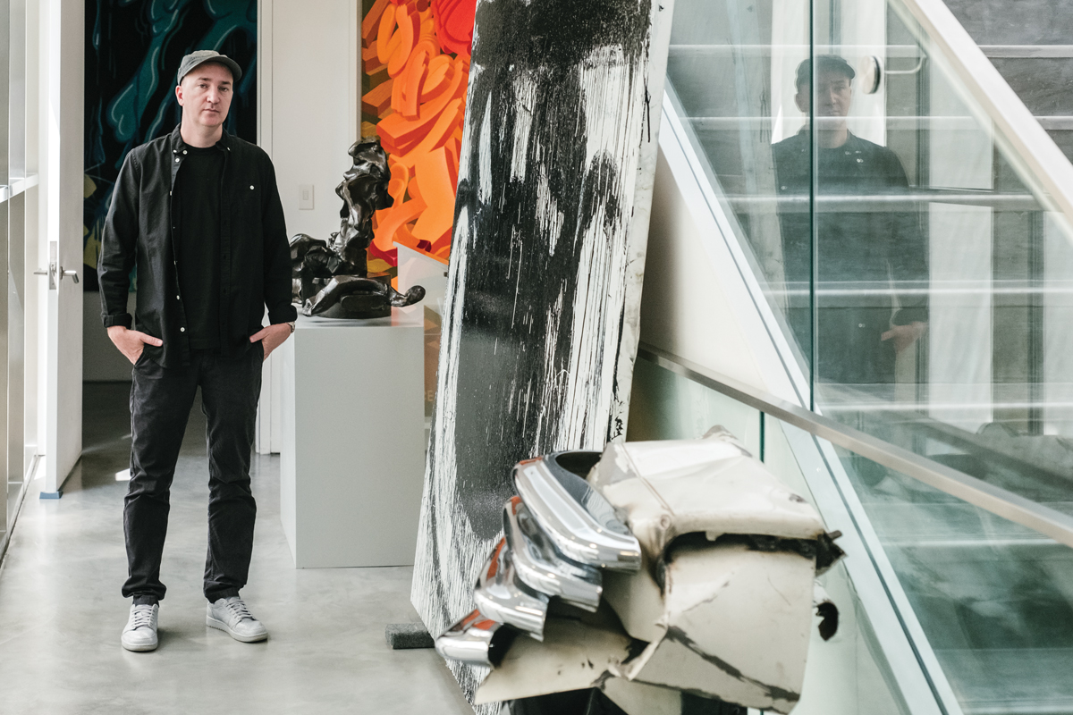 Donnelly with works by CRASH, Peter Saul, Willem de Kooning, Joyce Pensato, and John Chamberlain. PHOTO: DONALD STAHL FOR ARTNEWS