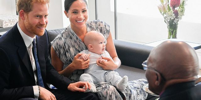 Britain's Duke and Duchess of Sussex, Prince Harry and his wife Meghan Markle hold their baby son Archie as they meet with Archbishop Desmond Tutu at the Tutu Legacy Foundation in Cape Town on Sep. 25, 2019. The British royal couple are on a 10-day tour of southern Africa -- their first official visit as a family since their son Archie was born in May.