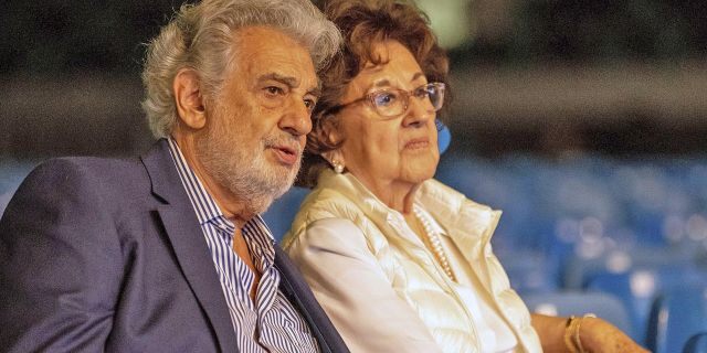 In this Tuesday, Aug. 27, 2019 file photo, Placido Domingo and his wife, Marta, attend a rehearsal for the opening gala of the Gerard of Sagredo Youth Forum and Sports Center in Szeged, Hungary, a day prior to the event. Melinda McLain, who was the production coordinator at LA Opera for its inaugural season in 1986-87 and also worked at the Houston Grand Opera, said she and others would invite Marta to attend company parties “because if Marta was around, he behaves.”