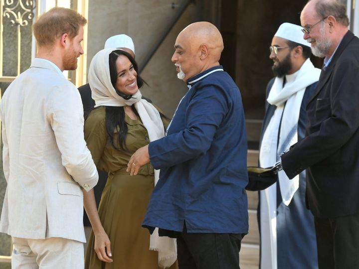 Meghan and Harry share greetings in the Bo-Kaap neighborhood of in Cape Town, South Africa.