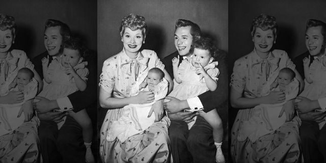 Lucille Ball and her husband, Cuban-born actor and bandleader Desi Arnaz, laugh and smile while holding their two children, Desi Jr., left, and Lucie, circa 1953.