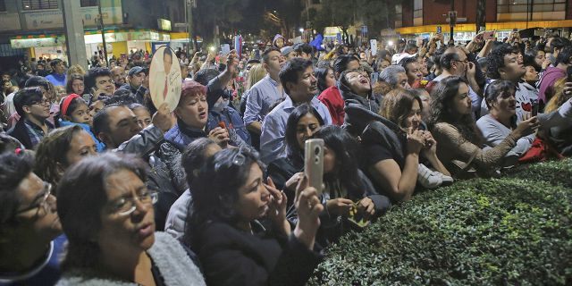 Fans gather to sing and remember Jose Jose while mourning his death at Jose Jose's statue in Mexico City, Saturday, Sept. 28, 2019. Mexican crooner Jose Jose, the elegant dresser who moved audiences to tears with melancholic love ballads and was known as the "Prince of Song," has died at the age of 71. Mexican artists' association ANDI confirmed the death in a Twitter post on Saturday.