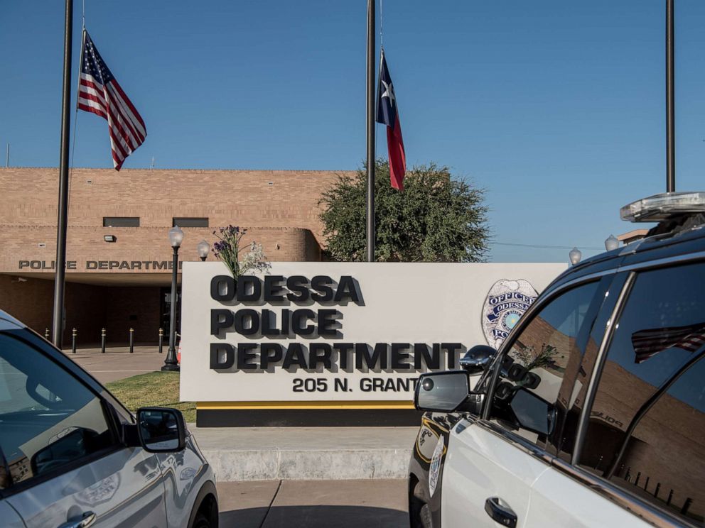 PHOTO: ODESSA, TX - SEPTEMBER 1: Flowers hang on the Odessa Police Department sign following a deadly shooting spree on September 1, 2019 in Odessa, Texas.