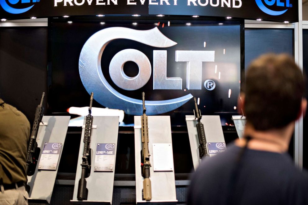 PHOTO:Rifles sit on display in the Colts Manufacturing Co. booth on the exhibition floor of the 144th National Rifle Association (NRA) Annual Meetings and Exhibits in Nashville, Tenn., April 11, 2015. 