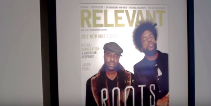 A Relevant magazine cover featuring an image of The Roots band is featured in a <a href="https://www.youtube.com/watch?v=Kq4m