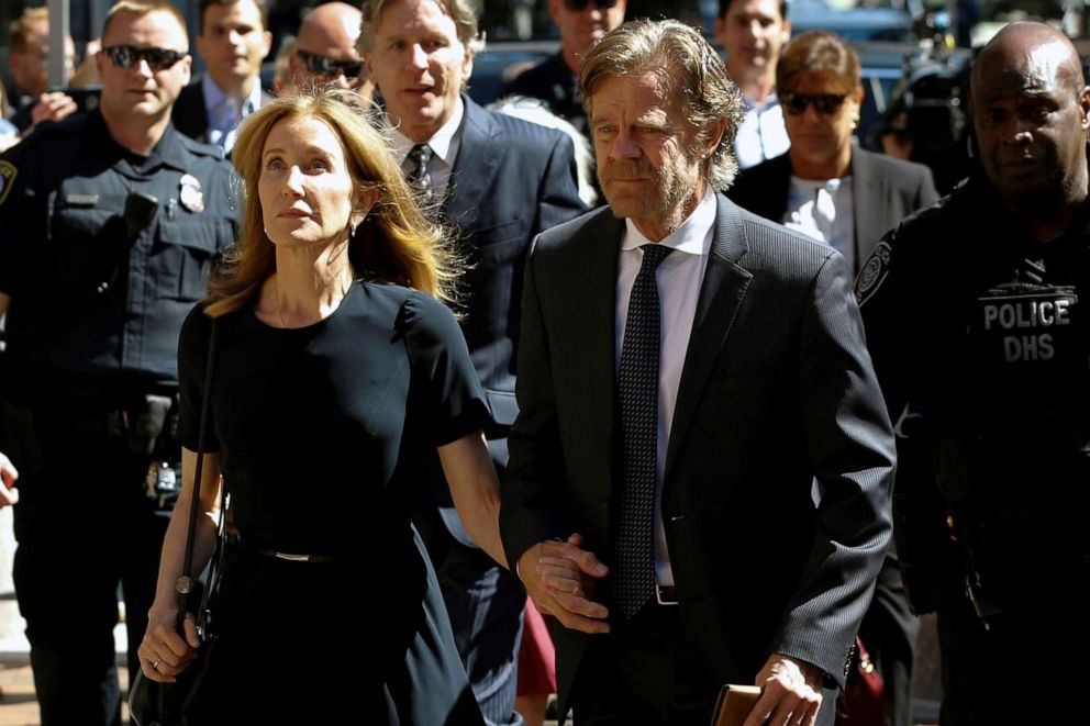 PHOTO: Actress Felicity Huffman arrives at the federal courthouse with her husband William H. Macy, before being sentenced in connection with a nationwide college admissions cheating scheme in Boston, Massachusetts, Sept. 13, 2019.