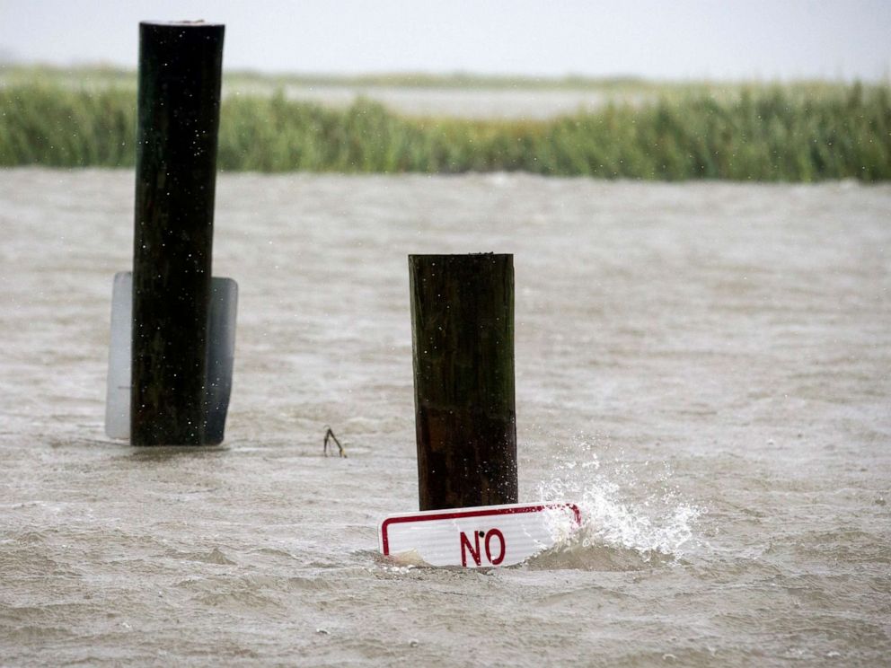 PHOTO: A sign at the Lazaretto Creek boat ramp as is nearly underwater at high tide as Hurricane Dorian makes its way up the east coast, Sept. 4, 2019, toward Tybee Island, Ga