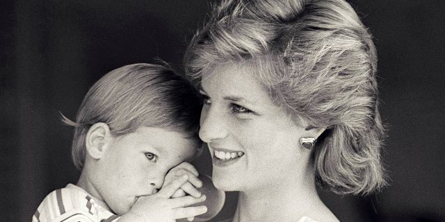 Britain's Princess Diana holds Prince Harry during a morning picture session at Marivent Palace, where the Prince and Princess of Wales are holidaying as guests of King Juan Carlos and Queen Sofia, in Mallorca, Spain August 9, 1988.