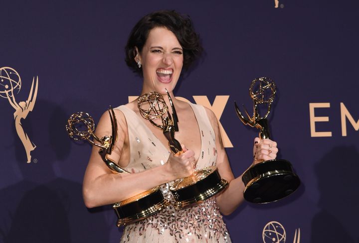 Phoebe Waller-Bridge poses with the Emmy for Outstanding Writing for a Comedy Series, Outstanding Lead Actress In A Comedy Se