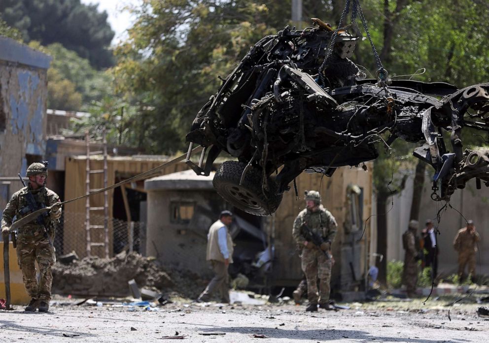 PHOTO: Resolute Support (RS) forces remove a damaged vehicle after a car bomb explosion in Kabul, Afghanistan, Sept. 5, 2019. A car bomb exploded near a neighborhood housing the U.S. Embassy in Kabul. 