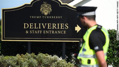 A police officer stands guard outside Trump Turnberry.