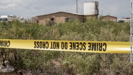 FBI agents search a home believed to be linked to Ator in West Odessa, Texas.  