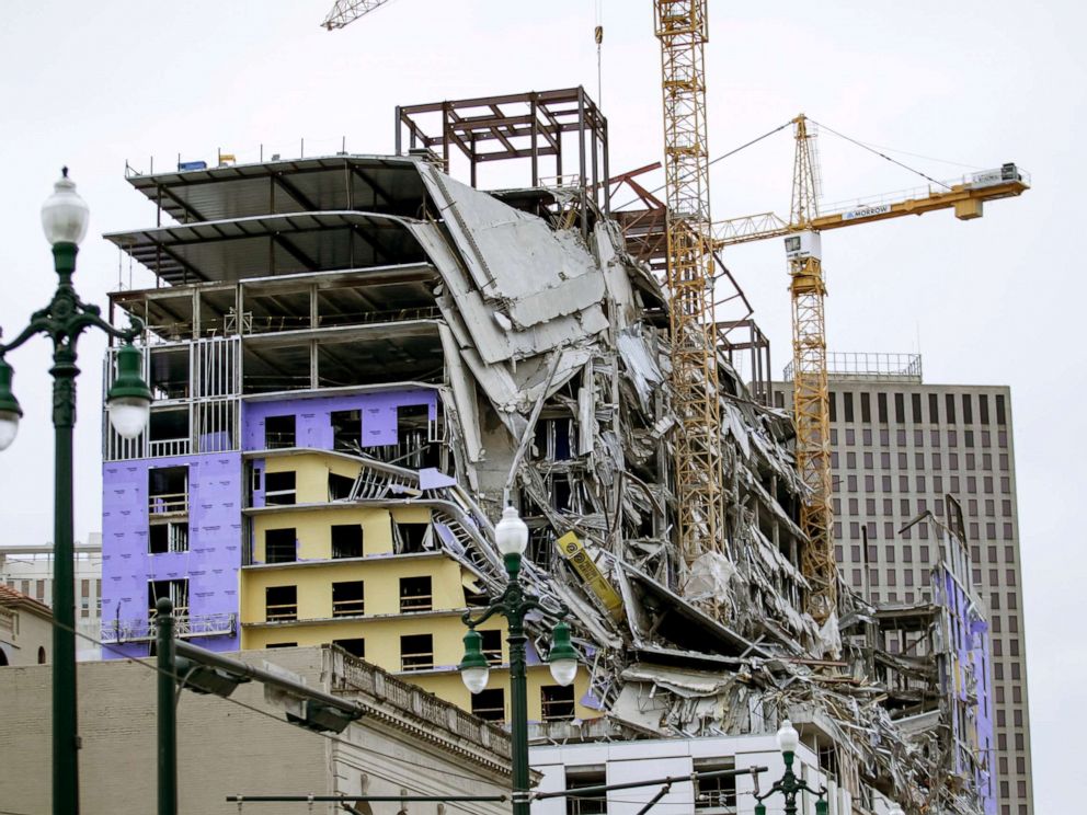 PHOTO: Debris hangs on the side of the building after a large portion of a hotel under construction suddenly collapsed in New Orleans on Oct. 12, 2019.