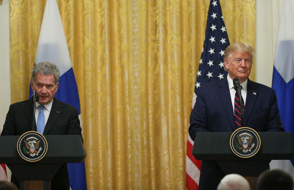 PHOTO: President Donald Trump listens as Finlands President Sauli Niinisto addresses a joint news conference in the East Room of the White House, Oct. 2, 2019. 