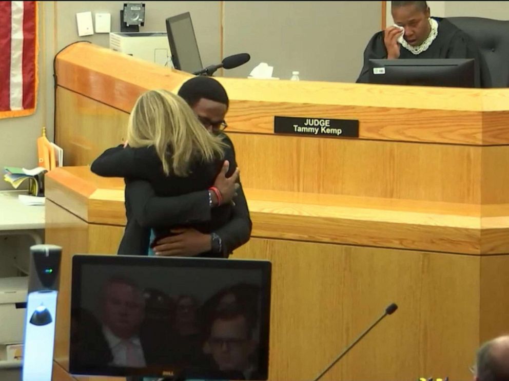 PHOTO: Botham Jeans brother Brandt hugs Amber Guyger after her sentencing, Oct 2, 2019.