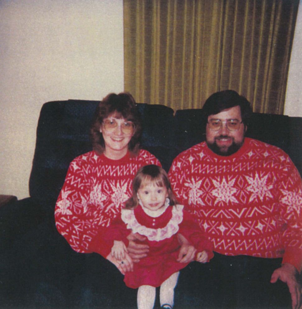 PHOTO: Heather with her adoptive parents Don and Frieda Robinson.