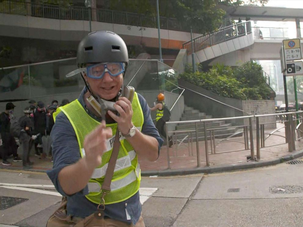 PHOTO: ABCs Ian Pannell reports during the protests in Hong Kong, Oct. 1, 2019, wearing a high-visibility vest with Press on it.