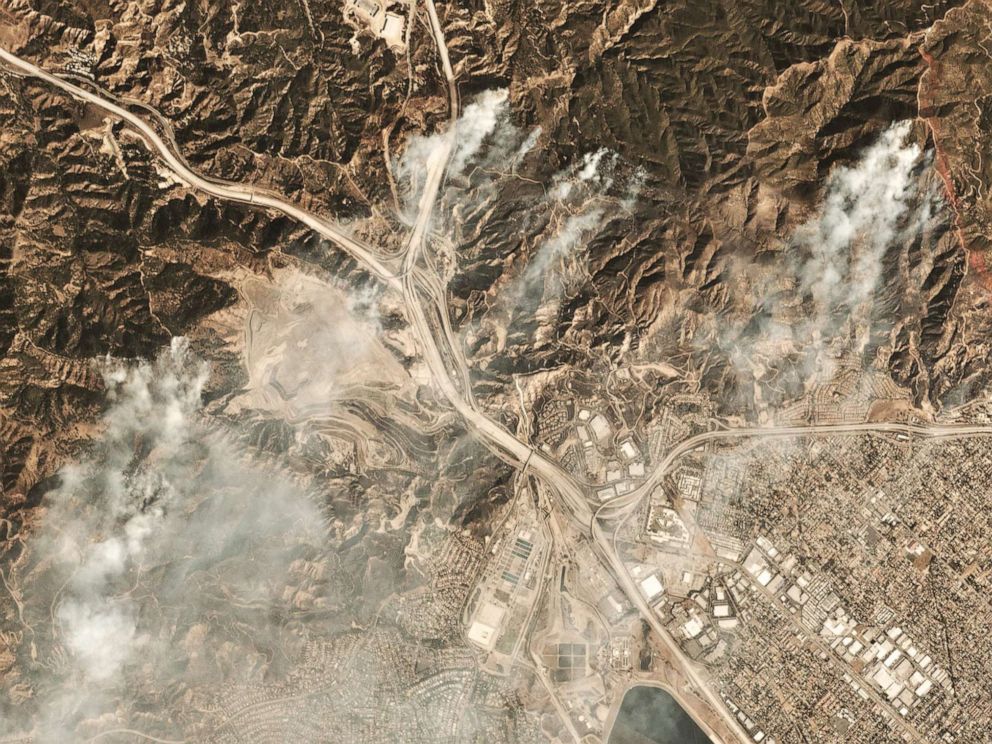 PHOTO: This October 11, 2019, image courtesy of Planet Labs Inc., shows smoke from the Saddleridge Fire about 20 miles north of downtown Los Angeles.
