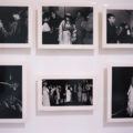 A detail of a group of gelatin silver prints documenting Lorraine O’Grady’s performance, 'Untitled (Mlle Bourgeoise Noire)', 1980–83/2009, where the artist would show up unannounced, dressed as a pageant queen, Mlle Bourgeoise Noire (Miss Black Middle-Class) 1955, in a gown made of 180 pairs of white gloves.