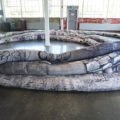 At the Small Arms Inspection Building, the Biennial’s second main venue in nearby city of Mississauga, Adrian Blackwell presents a second version of his 'Isonomia in Toronto?', here portrayed as a snaking 300-foot-long cushion that shows the urbanized shoreline of the Etobicoke Creek, an important water source to the area’s earliest inhabitants, the Mississauga people.