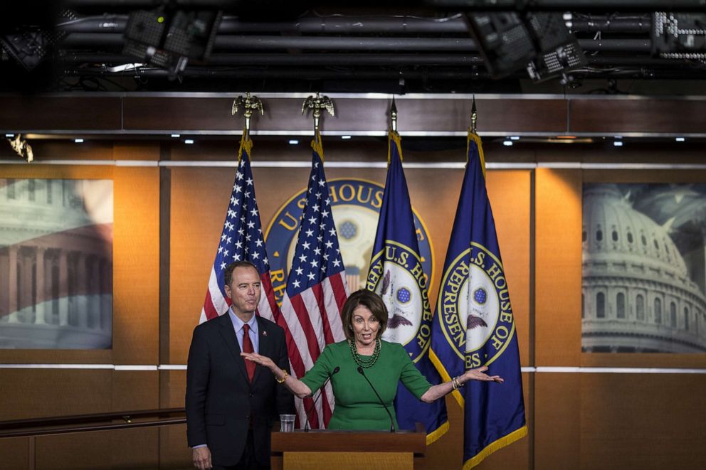 PHOTO: House Speaker Nancy Pelosi, D-CA, right, speaks while House Intelligence Committee Chairman Rep. Adam Schiff, D-CA, stands during a news conference on Capitol Hill on Oct. 15, 2019 in Washington, D.C.