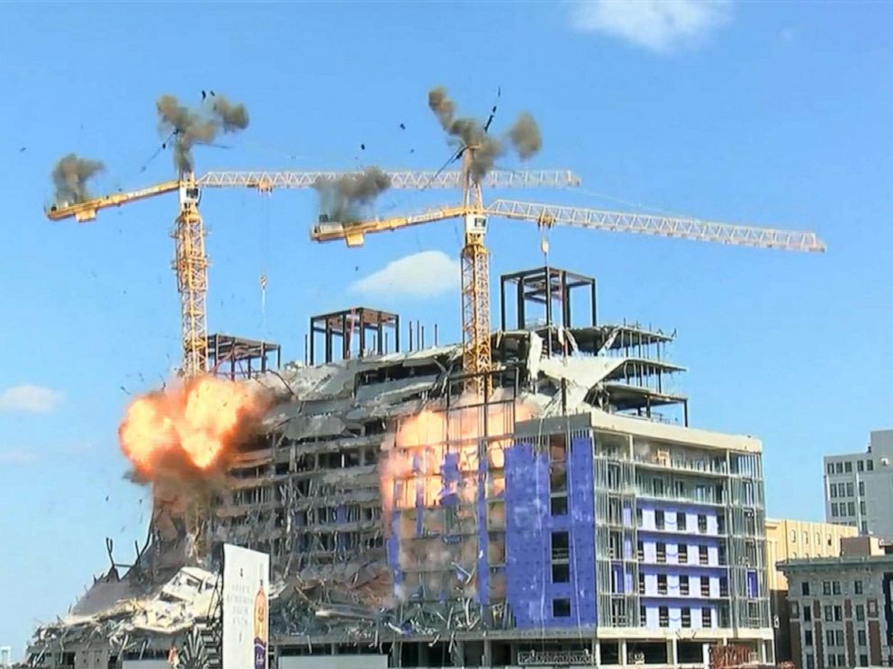 PHOTO: A controlled demolition brought down one of the cranes standing atop the Hard Rock Hotel in New Orleans, Oct. 20, 2019.