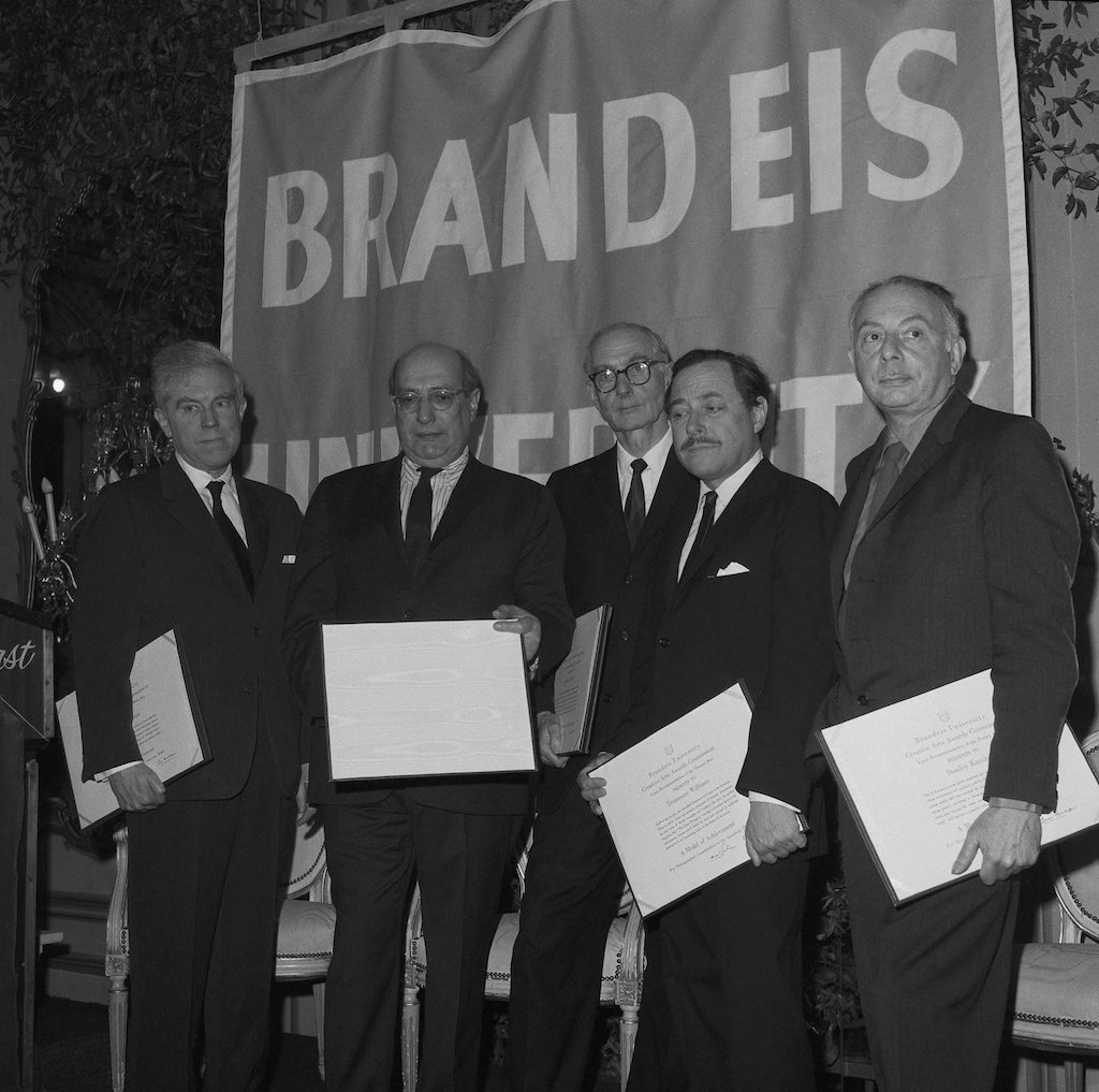 From left to right: composer Elliott Carter, painter Mark Rothko, Dr. Alfred H. Barr, Jr., director of museum collections at the Museum of Modern Art, playwright Tennessee Williams and poet Stanley Kunitz, stand with their Brandeis University 1965 Creative Arts awards