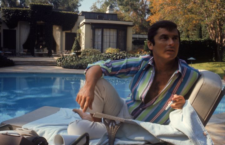 Then VP of Paramount Pictures Robert Evans studying his script by the pool at his home. (Photo by Alfred Eisenstaedt/The LIFE