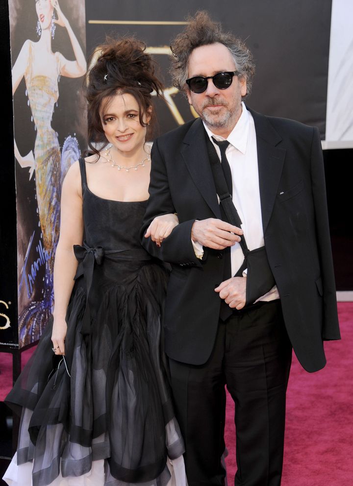 Helena Bonham Carter and director/husband Tim Burton arrive at the Oscars in 2013.&nbsp;