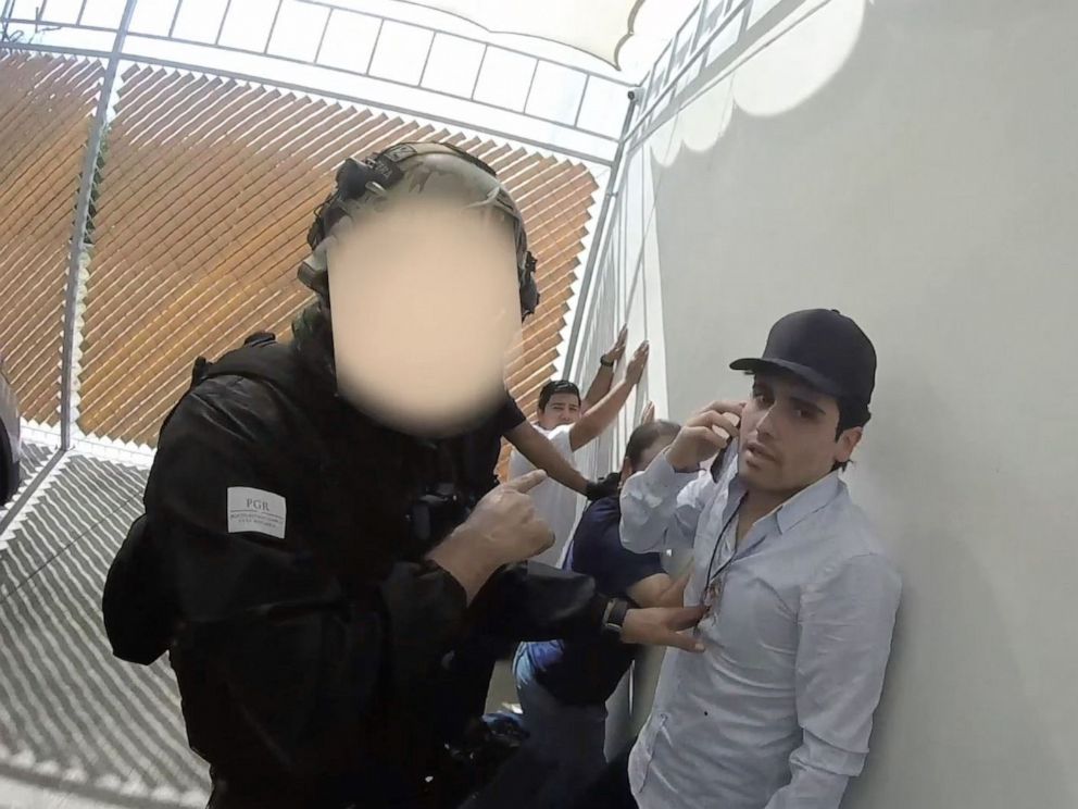 PHOTO: In this screenshot taken from a handout video, Ovidio Guzman, son of Joaquin Chapo Guzman, is arrested. The faces of the security forces have been digitally altered to protect their identities.