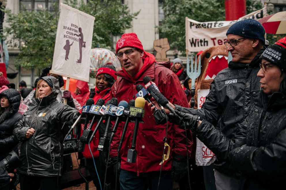 PHOTO: Chicago Teachers Union president Jesse Sharkey holds a press conference moments before a march through the streets near City Hall during the 11th day of an ongoing teachers strike, Oct. 31, 2019, in Chicago, Illinois.