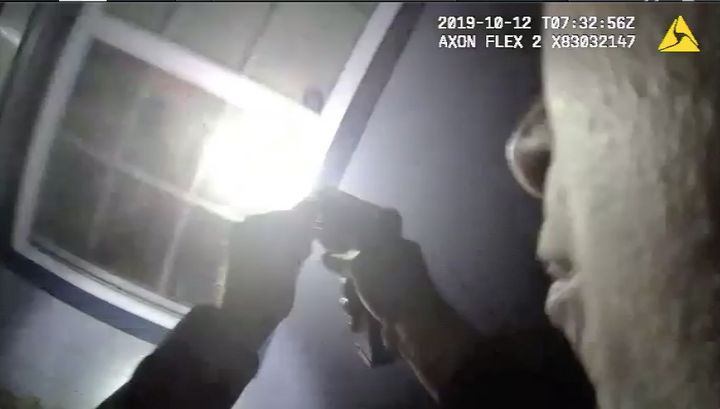 Body camera footage shows a Fort Worth police officer aiming a gun into the house of Atatiana Jefferson, who was shot and kil