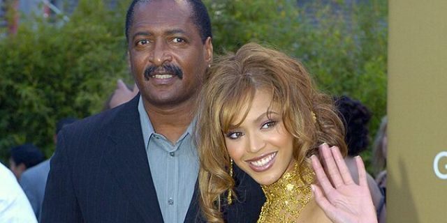 Beyonce Knowles (L) arrives at the 46th Annual Grammy Awards with her father and manager Mathew Knowles in Los Angeles.