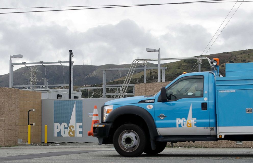 PHOTO: A Pacific Gas & Electric truck drives past a PG&E entrance in Daly City, Calif., Feb. 1, 2019. 