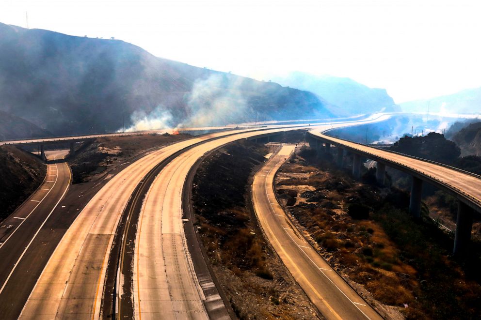 PHOTO: Freeway 5 and 14 are closed to traffic through Newhall Pass due to Saddle Ridge fire Oct. 11, 2019, in Newhall, Calif.