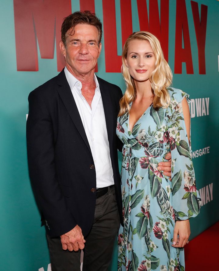 Dennis Quaid and fiancee Laura Savoie arrive at a screening of "Midway" in Honolulu.