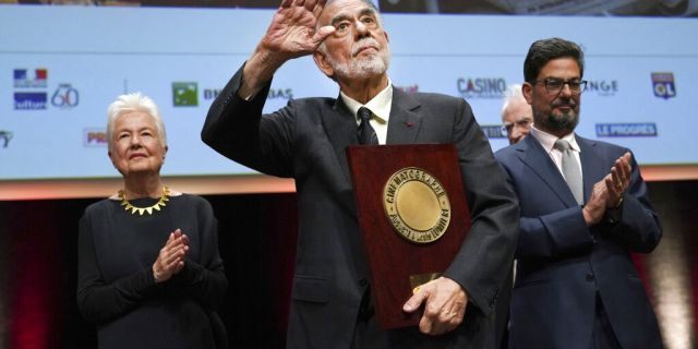 US director Francis Ford Coppola holds his award during the Lumiere Award ceremony of the 11th Lumiere Festival, in Lyon, central France. 