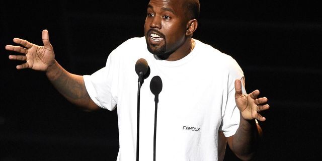 Kanye West appears at the MTV Video Music Awards at Madison Square Garden in New York. West held an outdoor worship service that attracted thousands to the Wyoming city where he owns a ranch.