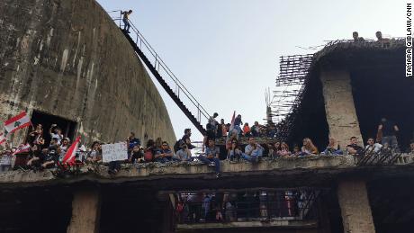 For over a week, protesters have taken over abandoned structures long shut off to the public.