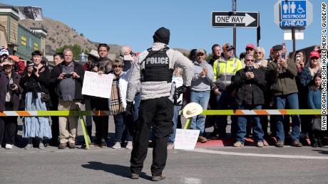 Spectators gather at the Town Square in Jackson, Wyoming, to try and catch a glimpse of first lady Melania Trump as she visits a group of Boy Scouts on Thursday, October 3.