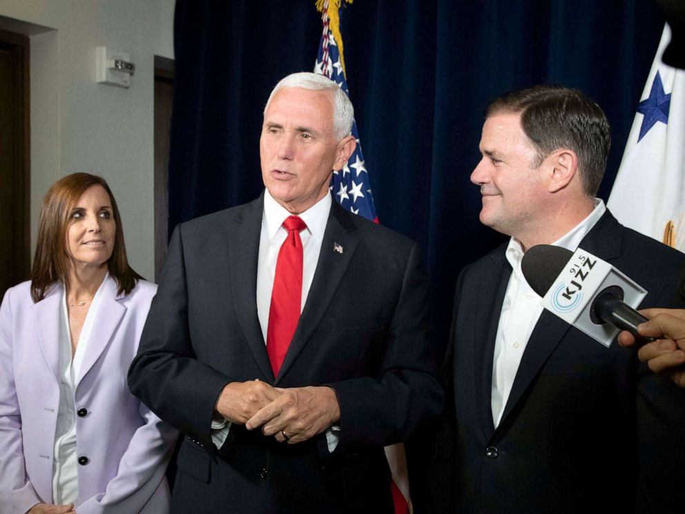 PHOTO: Vice President Mike Pence answers questions from members of the press after a discussion with Latino leaders in Phoenix, Ariz., Oct. 3, 2019.