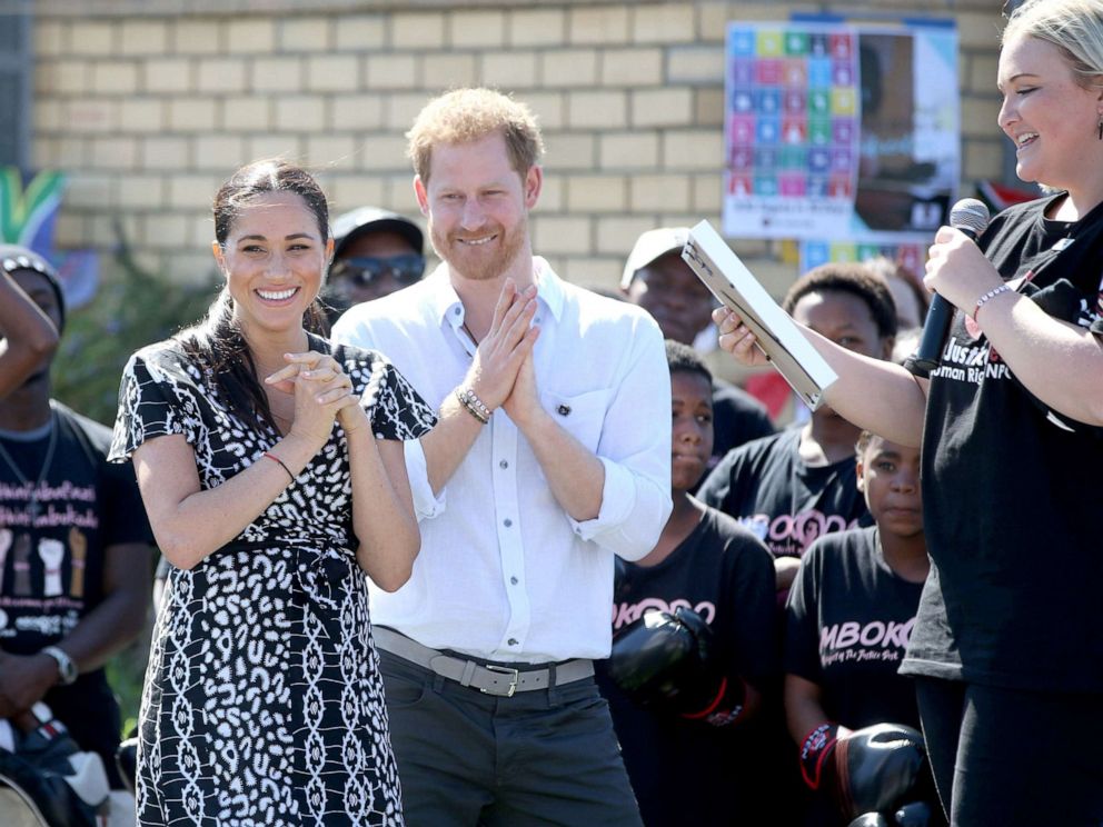 PHOTO: Prince Harry Duke of Sussex and Meghan Markle Duchess of Sussex during a visit to the Justice desk, an NGO in the township of Nyanga in Cape Town, South Africa as they begin their tour of the region, Sept 26, 2019.